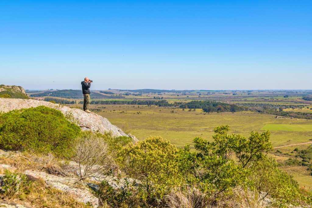 Man at Top Of Hill, Arequita Park, Lavalleja, Uruguay | Ambienta